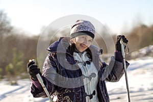 Woman skiing in the forest healthy lifestyle