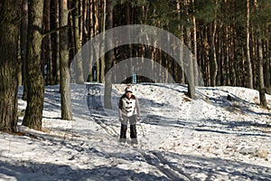 Woman skiing in the forest healthy lifestyle