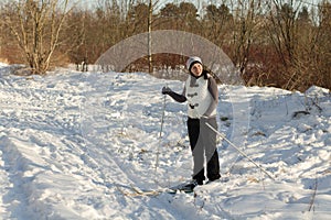 Woman skiing in the forest healthy lifestyle