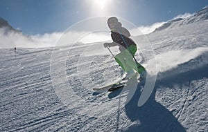 A woman is skiing at a ski resort, Kitzsteinhorn glaci