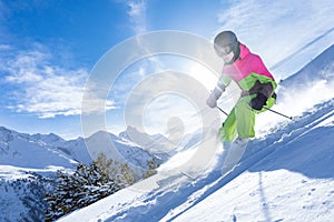 Woman is skiing in a winter paradise