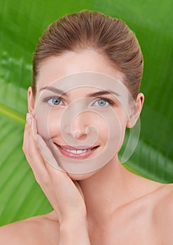 Woman, skincare and portrait with leaves, palm tree and sustainability for organic cosmetics. Girl, person or model with