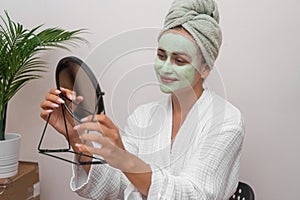 woman skincare shines moisturizing facial mask, unveiling beauty in her home sanctuary.