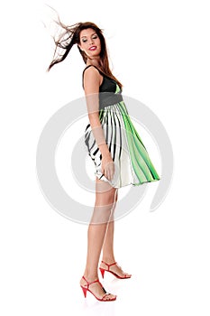 woman in skirt blown by wind