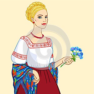 Woman of Slavic appearance in ancient clothes, a portrait isolated on a beige background