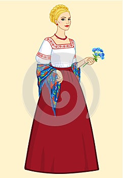 Woman of Slavic appearance in ancient clothes photo