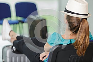 Woman sleeping at airport delay