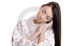Woman sleeping. Beautiful girl in pajamas falling asleep.