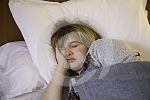 Woman sleeping in bed