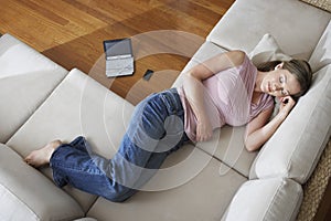 Woman Sleeping On A Couch