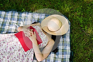 Woman sleeping in the grass outside