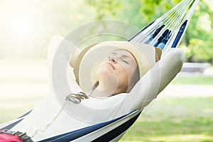 Woman Sleeping In Hammock