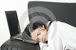 Woman sleeping with laptop