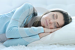 Woman sleeping on pillow