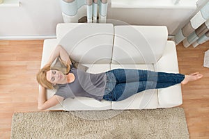 Woman Sleeping On Sofa