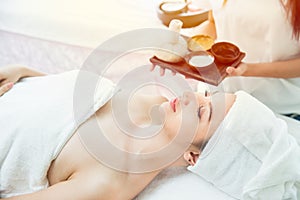 Woman sleeping at spa with aroma scent natural