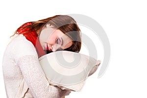 Woman sleepy tired with pillow almost falling asleep