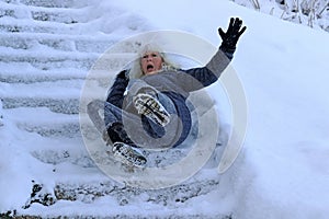 A woman slipped and fell on a wintry staircase