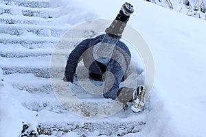 A woman slipped and fell on a wintry staircase