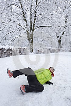 Woman slipped on a snow and ice