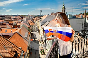 Woman with slovak flag in Bratislava