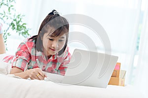 Woman small business owner, business start up in bedroom, young