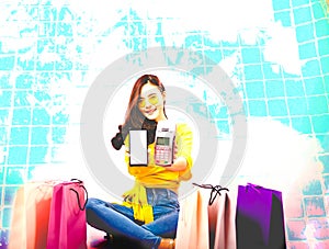 Woman with smartphone & credit card swiping machine. shopping lifestyle & payment with nfc technology