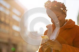 Woman with smartphone in an urban city area