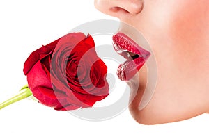 woman smelling flower, sensual red lips