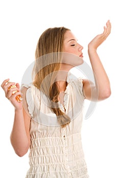 Woman smelling perfume