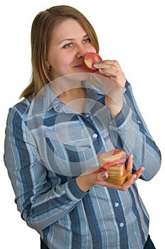 Woman smells a soap slice in hand