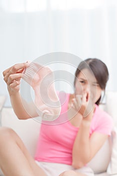Woman with smelly socks photo