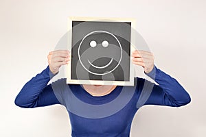 Woman with smile in blackboard photo