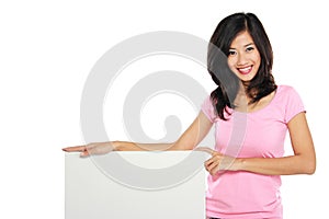 Woman smile brightly holding white blank board