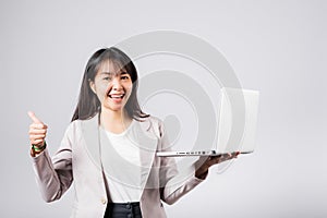 Woman smile confident smiling face hold using laptop computer and showing thumb up