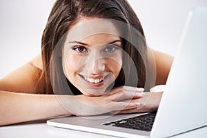 Woman, smile and on laptop to relax, portrait and happy for rest, positive mindset and face. Female person, peace and