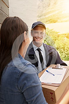 Woman, smile and signature for package, delivery man and shipping order with paperwork and parcel. Cardboard box, sign