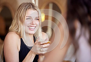 Woman, smile and talking with friends in cafe, laughing or having fun together in shop. Restaurant, tea and happy girls