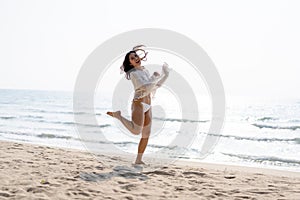 Woman Smiles happy Run, Jump and Dance on the Holiday Summer