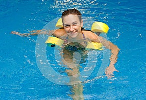 Woman smiling in aqua aerobics