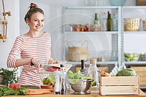 Woman smiling during cooking