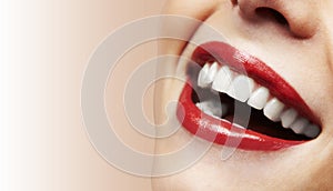 Woman smiling with great teeth on white background