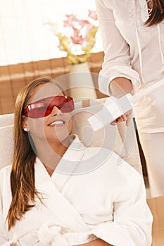 Woman smiling after laser tooth whitening