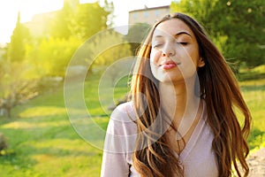 Woman smiling looking up taking deep breath celebrating freedom. Positive human emotion face expression feeling life perception