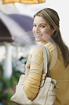 Woman Smiling over Shoulder