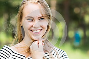 Woman smiling with perfect smile