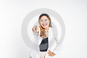 woman smiling while pointing her finger toward camera