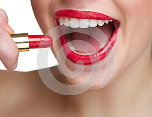 Woman smiling with red lipstick