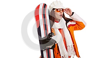 Woman smiling skier girl wearing fur vest ski googles.