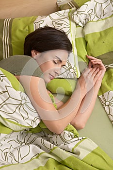 Woman smiling in sleep